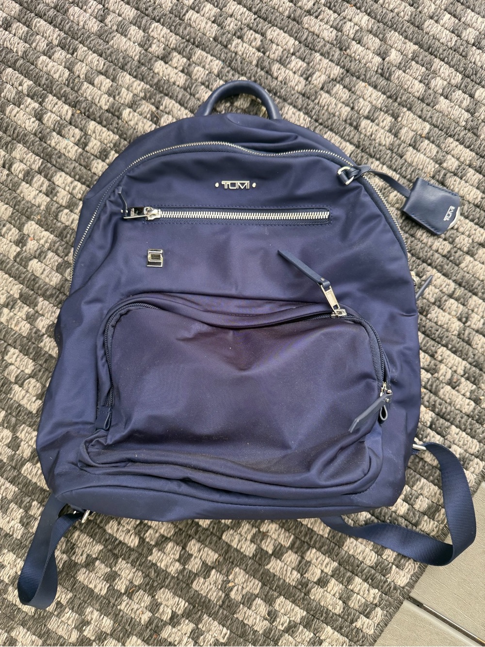 Tumi Navy Blue Backpack with Silver Hardware